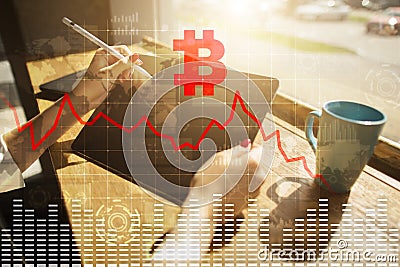 Cryptocurrency crisis on virtual screen. Bitcoin and Ethereum falls. Stock Photo