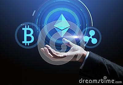 Close up of hand with at cryptocurrency icons Editorial Stock Photo