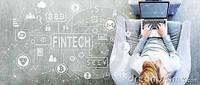 Cryptocurrency Fintech Theme with man using a laptop Stock Photo