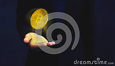 Cryptocurrency Management Concept. Golden Bitcoin Money Floating Stock Photo