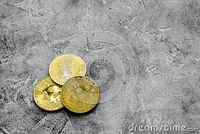 Cryptocurrency physical golden bitcoin coins for changing or selling stone background mock up Stock Photo