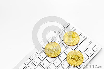Cryptocurrency physical golden bitcoin coins for changing or selling white background mock up Stock Photo