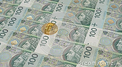 Bitcoin cash (BTC) cryptocurrency pictured as a gold coin lying over cash polish zÅ‚oty (polish currency) Stock Photo