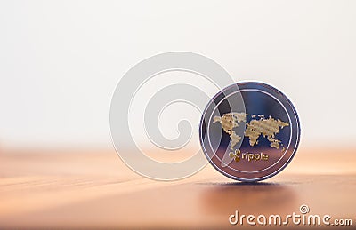 Cryptocurrency Ripple coin world map sign, white background. Editorial Stock Photo