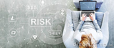 Cryptocurrency Risk Theme with man using a laptop Stock Photo