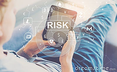 Cryptocurrency Risk Theme with man using a tablet Stock Photo