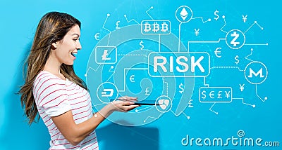 Cryptocurrency risk theme with young woman using tablet Stock Photo