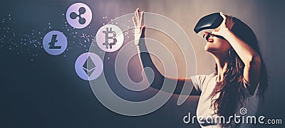 Cryptocurrency with woman using a virtual reality headset Editorial Stock Photo