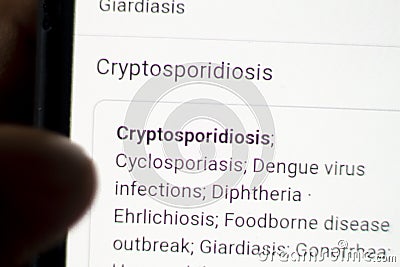 Cryptosporidiosis News on the phone.Mobile phone in hands. selective focus and chromatic aberration effects Stock Photo