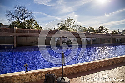 the crypts of Martin Luther King and Coretta Scott King with a pool of rippling water with blue tile, a red brick footpath Stock Photo