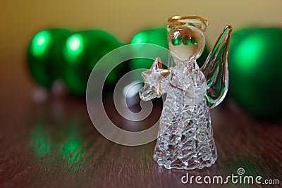 Crystal Angel on the background of Christmas balls. cristmas dec Stock Photo