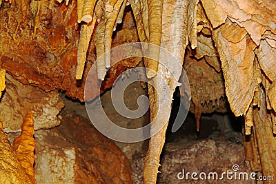 The crystal caves of Bermuda. Incredible formations of white stalactites covered with crystallized soda straws. Stock Photo