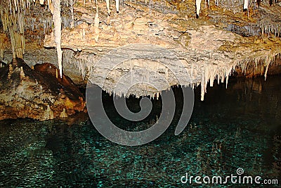 The crystal caves of Bermuda. Incredible formations of white stalactites covered with crystallized soda straws. Stock Photo