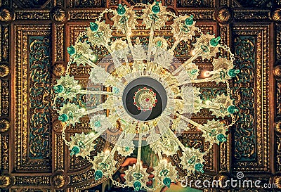Crystal Chandelier and wood sculptured ceiling Editorial Stock Photo