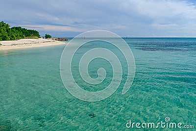 The crystal clear and shallow waters on the islands of the tropical Dry tortugas and the clean and private beaches Stock Photo