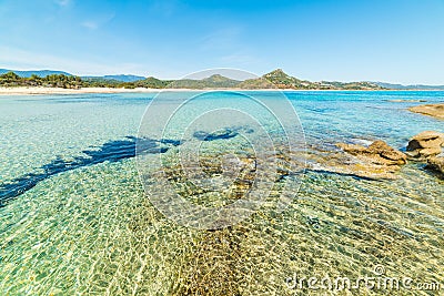 Crystal clear water in Scoglio di Peppino beach Stock Photo