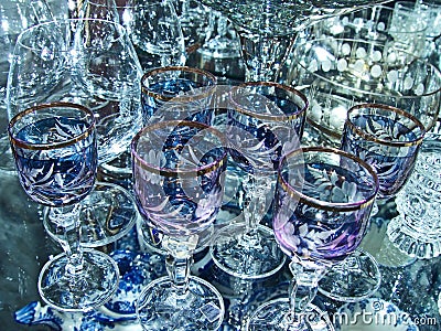 Crystal glasses for vodka, champagne and wine. Table setting. Closeup Stock Photo