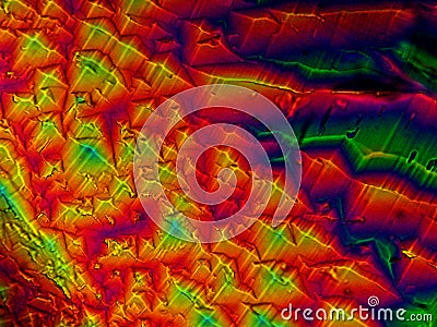 Crystal layer on microscope object glass, seen in polarized light. This causes random unforeseeable color effects Stock Photo