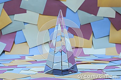 crystal pyramid on Colorful sticky notes Stock Photo