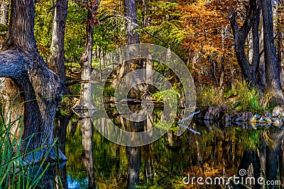 Crystal Reflections of Fall Foliage at Garner State Park, Texas Stock Photo