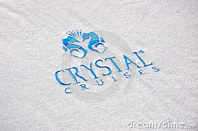 Crystal Serenity cruise ship open deck pool towel with Cryslal Cruises logo Editorial Stock Photo