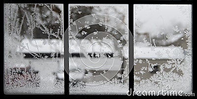 Crystal snowflakes on icy window Stock Photo