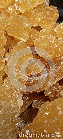 crystalline grape sugar, dark yellow and light brown, crystals Stock Photo