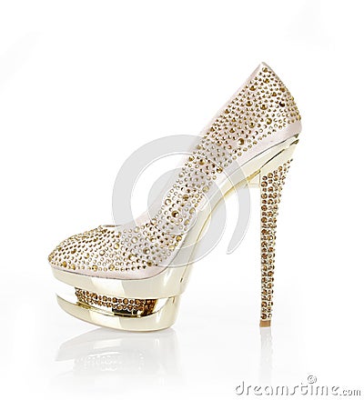 Crystals encrusted gold shoe Stock Photo