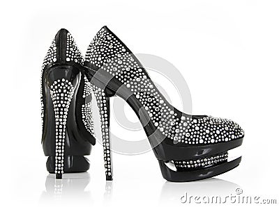 Crystals encrusted pair of black shoes Stock Photo