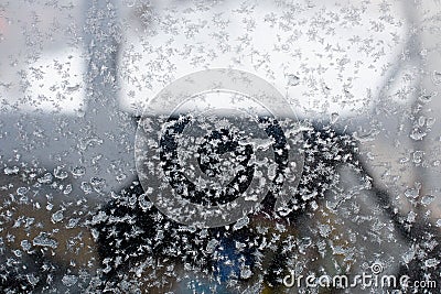 Crystals of ice on a car glass close up Stock Photo