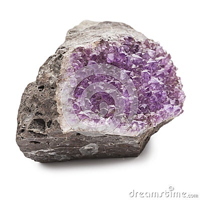 Crystals of lilac amethyst on a fracture of brown stone. Semiprecious stone Stock Photo