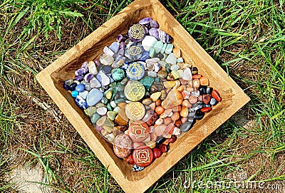 Crystals in Wooden Box : CHAKRASTONES Polished Raw Lake Stones Gems River Water Rocks Pink Nails Stock Photo