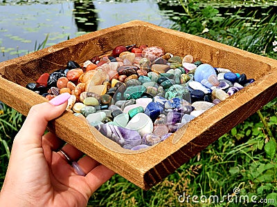 Crystals in Wooden Box : CHAKRASTONES Polished Raw Lake Stones Gems River Water Rocks Stock Photo