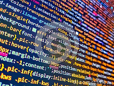 Css3 code on a colorful background. SEO concepts for better SERP. Green butterfly wing texture as very nice background. Web Stock Photo
