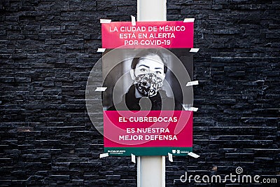 Cuauhtemoc Mexico City Mexico - January 8 2021: Posters line the streets of Mexico City promoting wearing masks Editorial Stock Photo