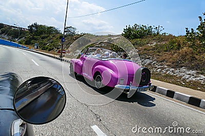 Cuba two old pink car on the road Editorial Stock Photo