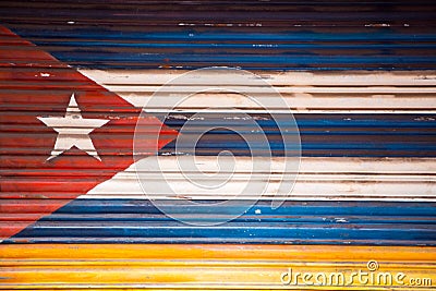 Cuban flag painted on a door, Banos Ecuador Stock Photo