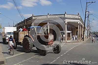 Cuban man drives tractor at the street of Pinar del Rio, Cuba. Editorial Stock Photo