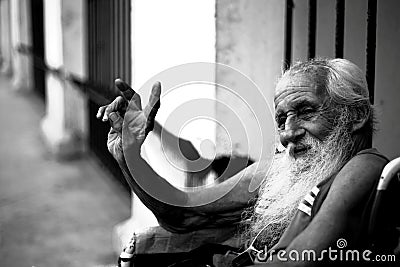 Havana,Cuba - victory sign by handicapped older men Editorial Stock Photo