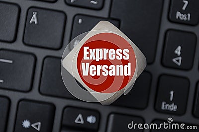 Cube dice with the german word for express delivery - Expressversand Stock Photo
