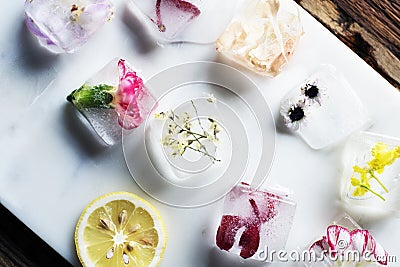 Cube ice with flower inside Stock Photo