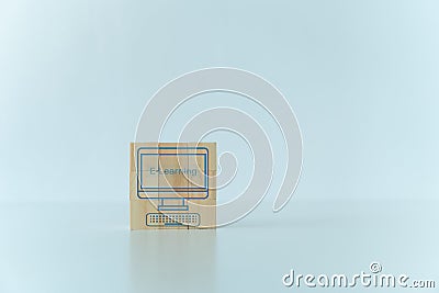 Cube with icon of e-learning. Learning or training skill course or classroom online at home. Conceptual idea of education Stock Photo