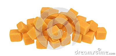 Cubed mild cheddar cheese on a white background Stock Photo