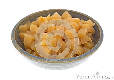 Cubed rutabagas in an old bowl Stock Photo