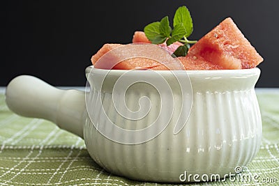 Cubed watermelon serving in a ceramic bowl Stock Photo