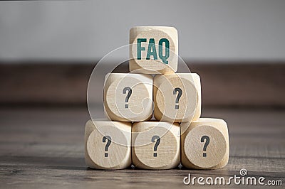 Cubes and dice with acronym faq frequently asked questions Stock Photo