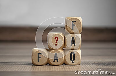 Cubes and dice with acronym faq frequently asked questions Stock Photo