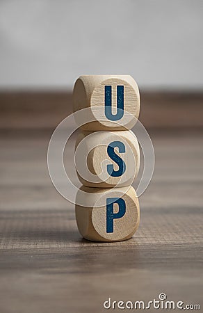 Cubes and dice with acronym USP unique selling proposition or unique selling point Stock Photo