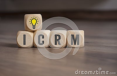 Cubes and dice with ICRM customer relationship management Stock Photo