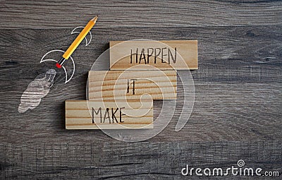 Cubes and dice showing the words Make it Happen Stock Photo